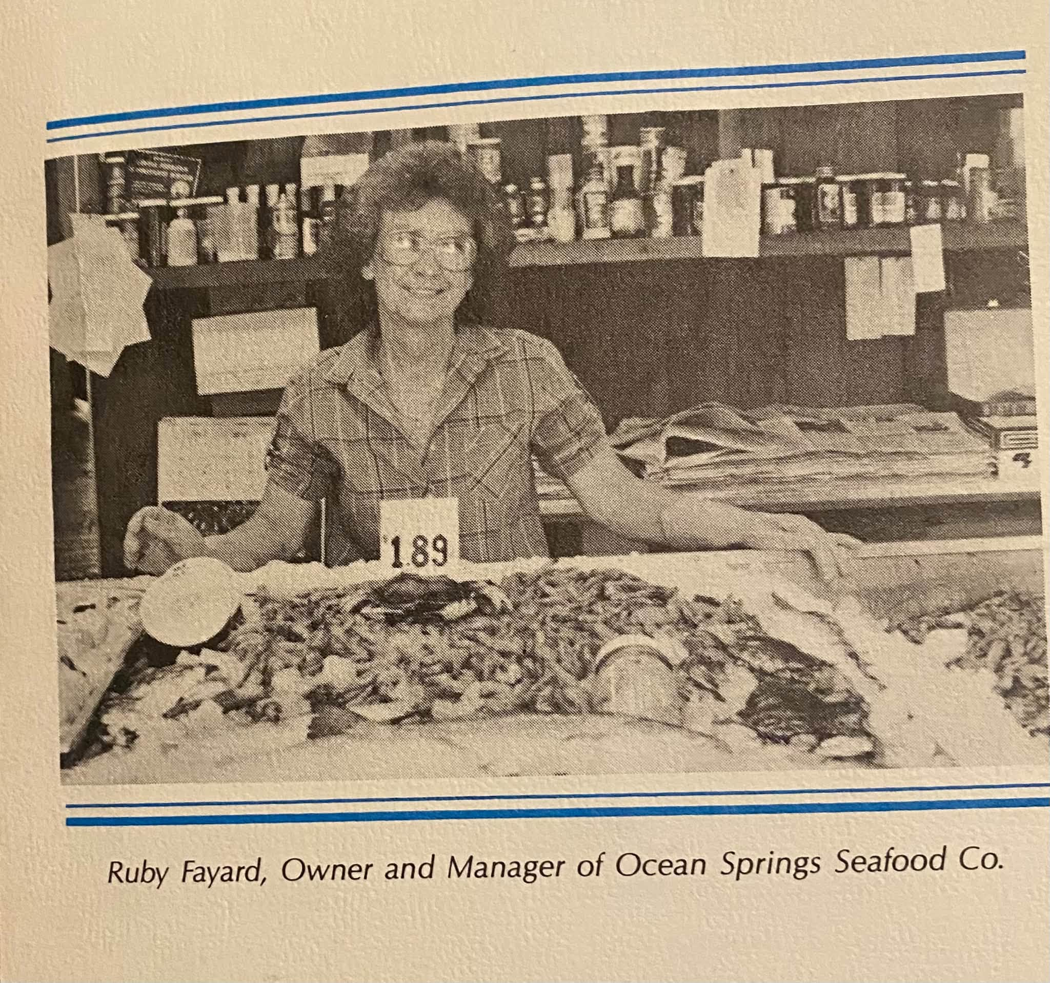 Ruby Fayard behind the seafood counter at Ocean Springs Seafood Co.